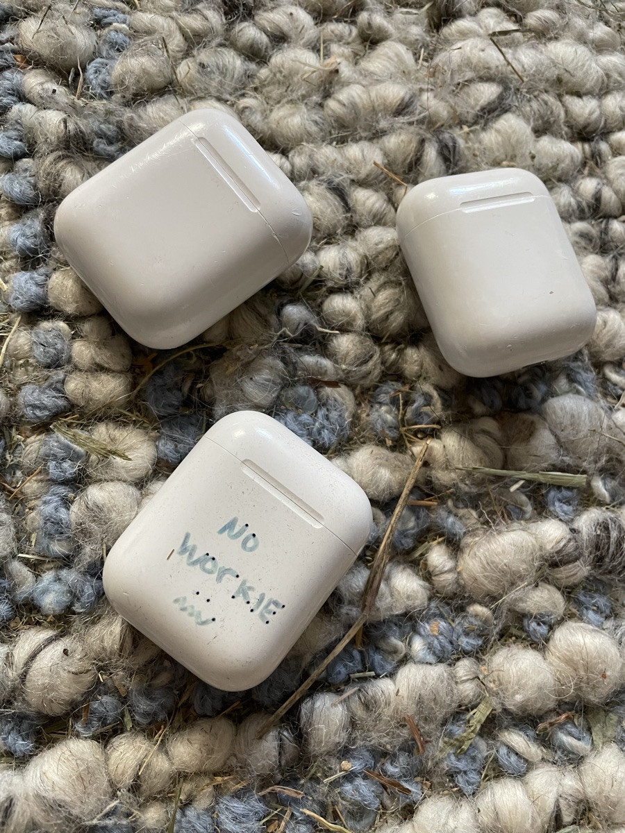 Airpod cases, one w nonfunctional pods