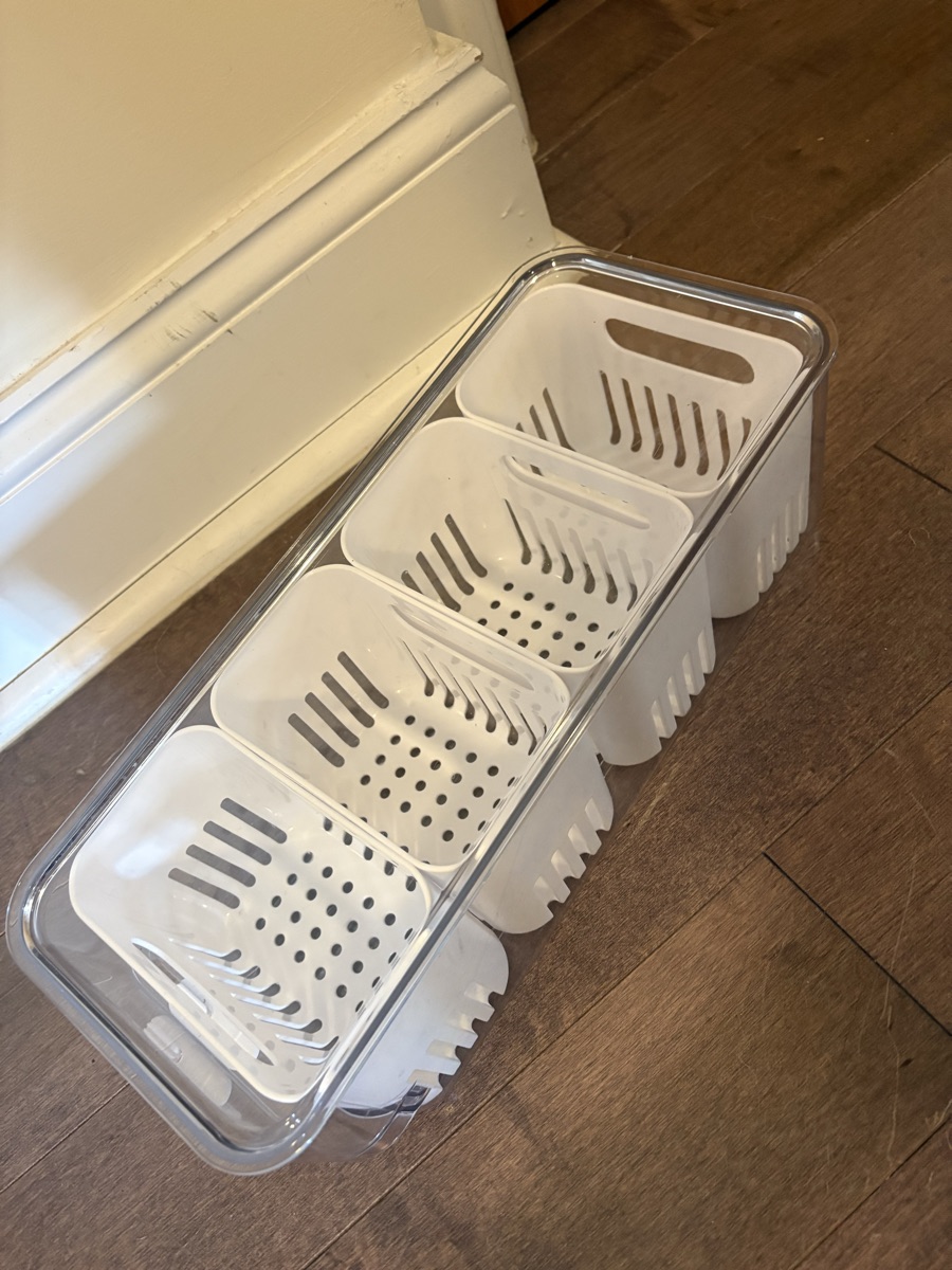 Fridge storage bin with baskets