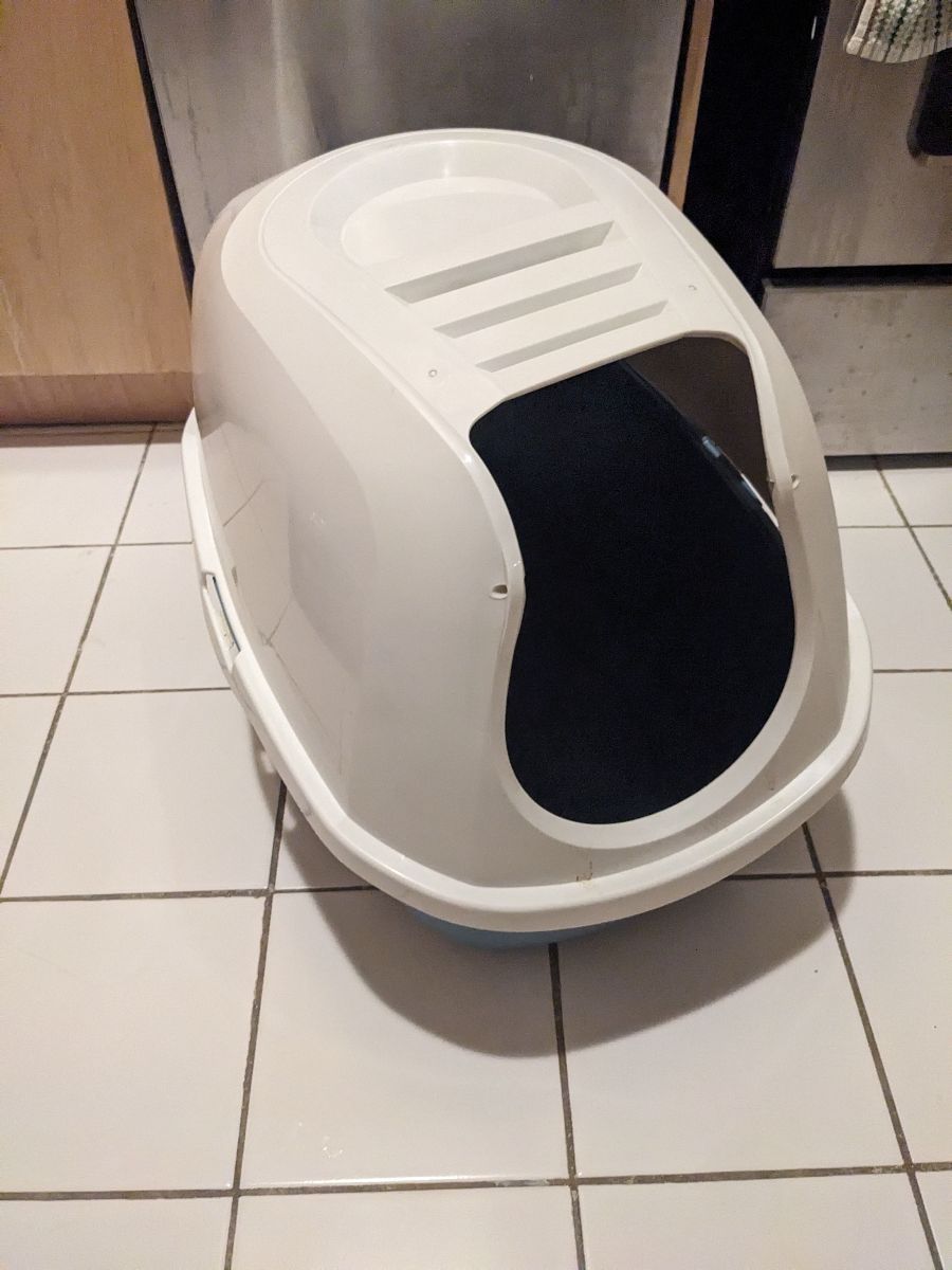 Covered cat litter box