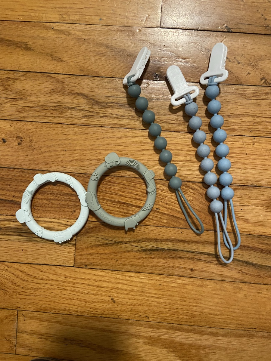 Baby chewing rings and pacifier clips