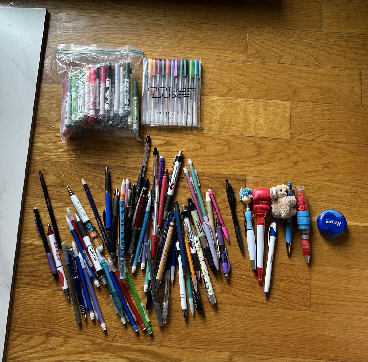 Bag of pens, pencils, and markers