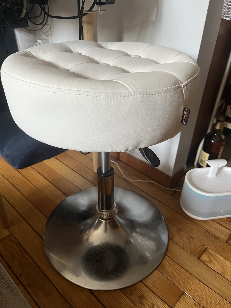 Height adjustable swivel stool