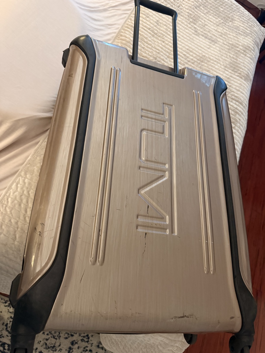 Tumi large hardside suitcase