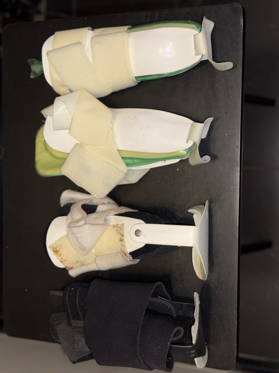 4 Velcro/plastic ankle braces 