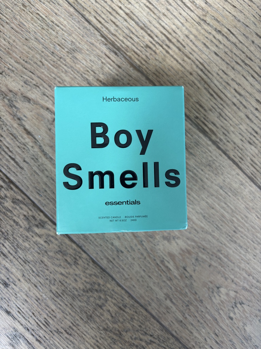 Boy Smells Candle